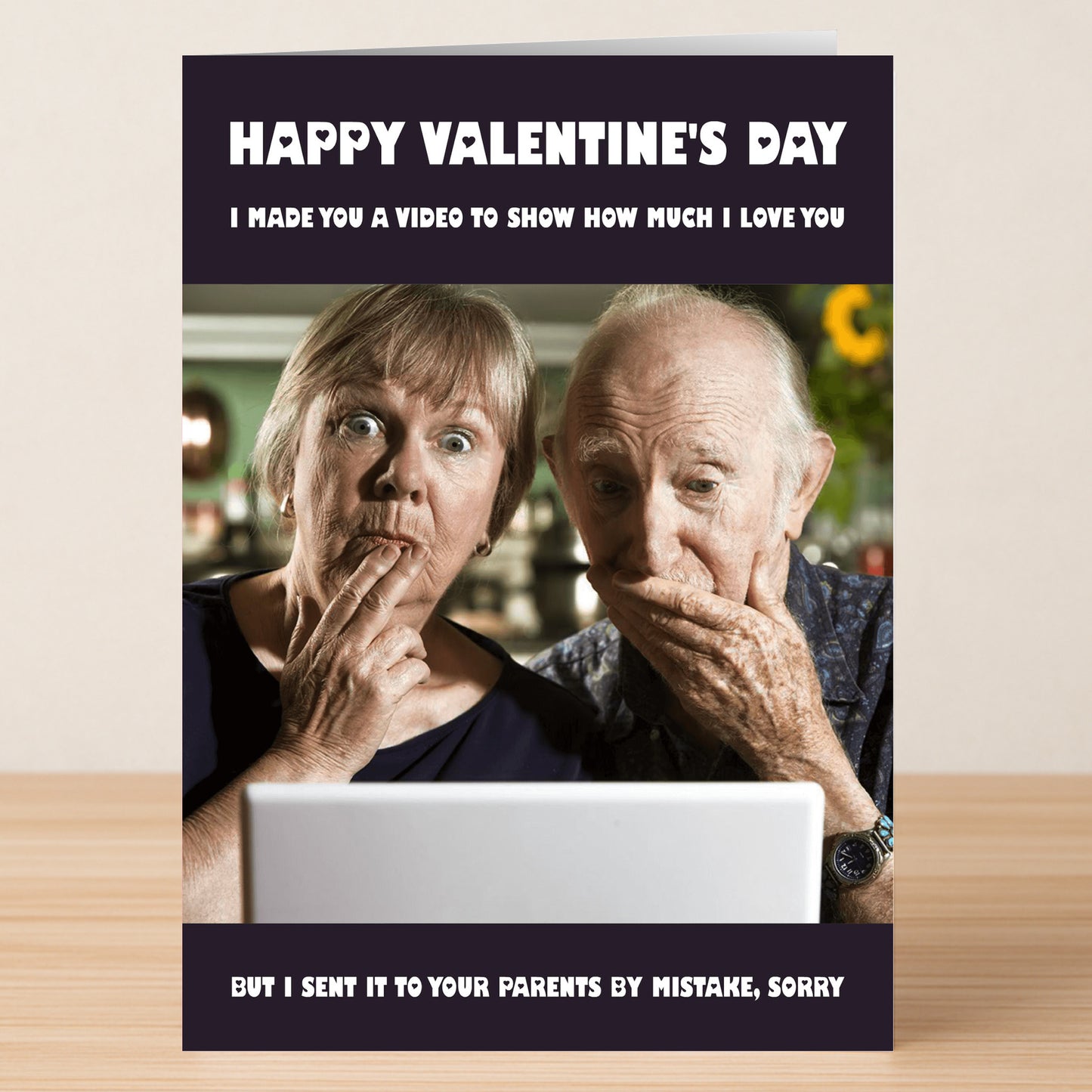 The Mistake Funny Valentine's Card by Twisted Gifts features an older couple surprised at a laptop with the message: "Happy Valentine's Day. I made you a video... but I sent it to your parents by mistake, sorry." Hilarious and unique!.