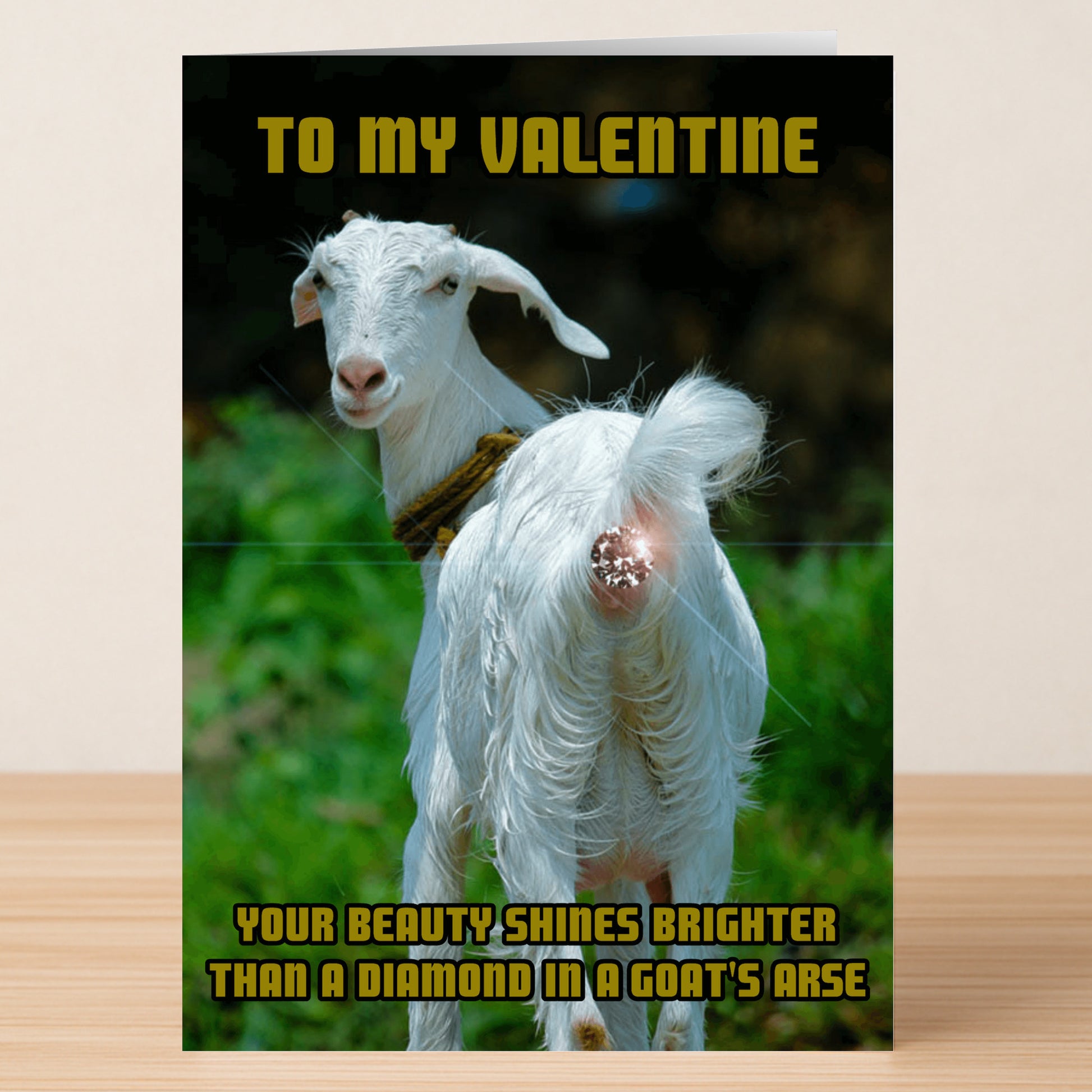 The Goats Arse Rude Valentine's Card by Twisted Gifts features a goat’s rear with the message: "Your beauty shines brighter than a diamond in a goat's arse." A cheeky and humorous choice for Valentine’s Day!.
