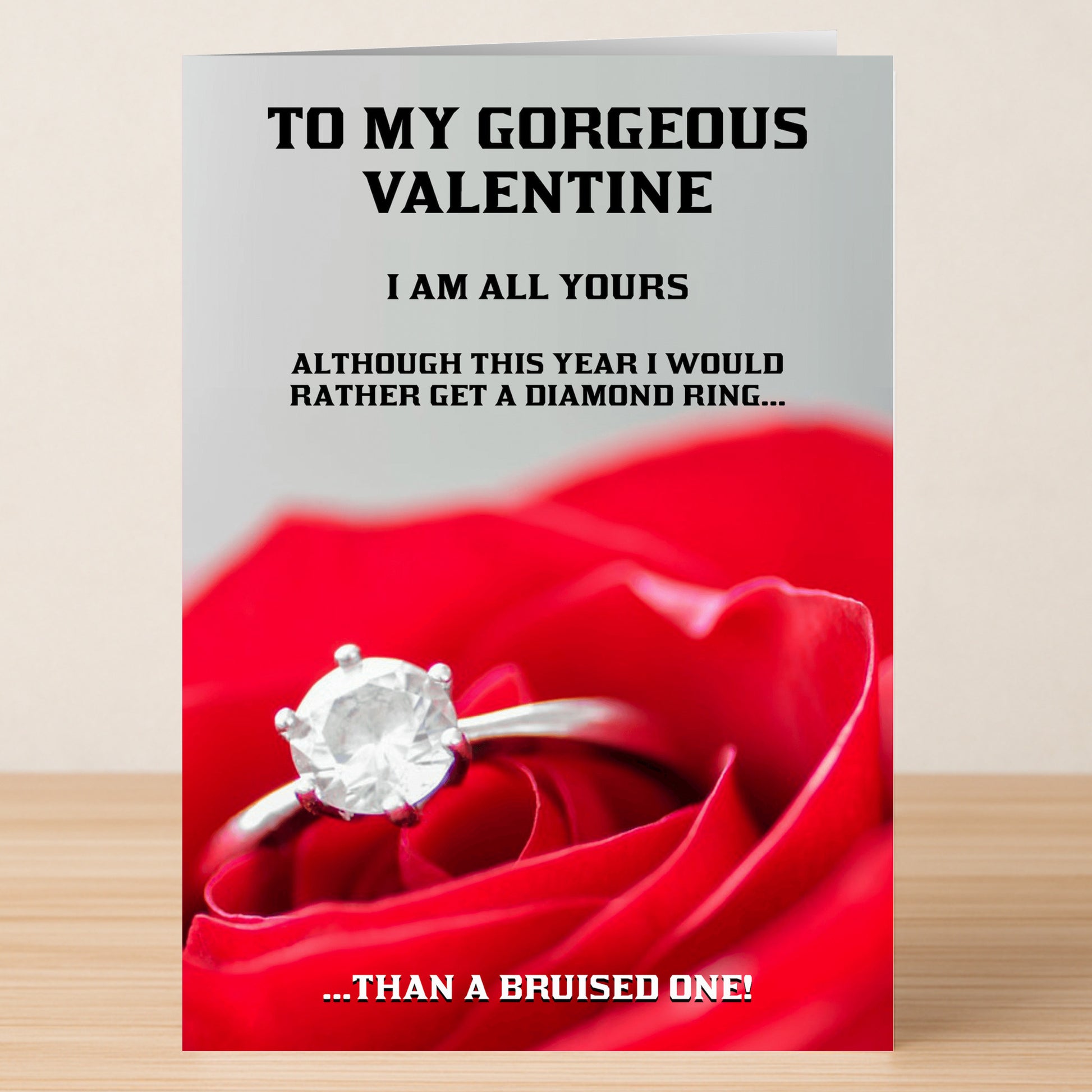 Surprise your partner with the Diamond Ring Rude Valentine’s Card by Twisted Gifts—featuring a diamond ring on a red rose and a cheeky message sure to make them smile.