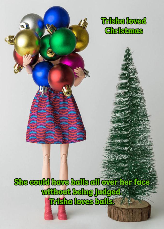 An image of a woman holding a bunch of Christmas ornaments, perfect for a Twisted Gifts Loves Balls Rude Christmas Card.