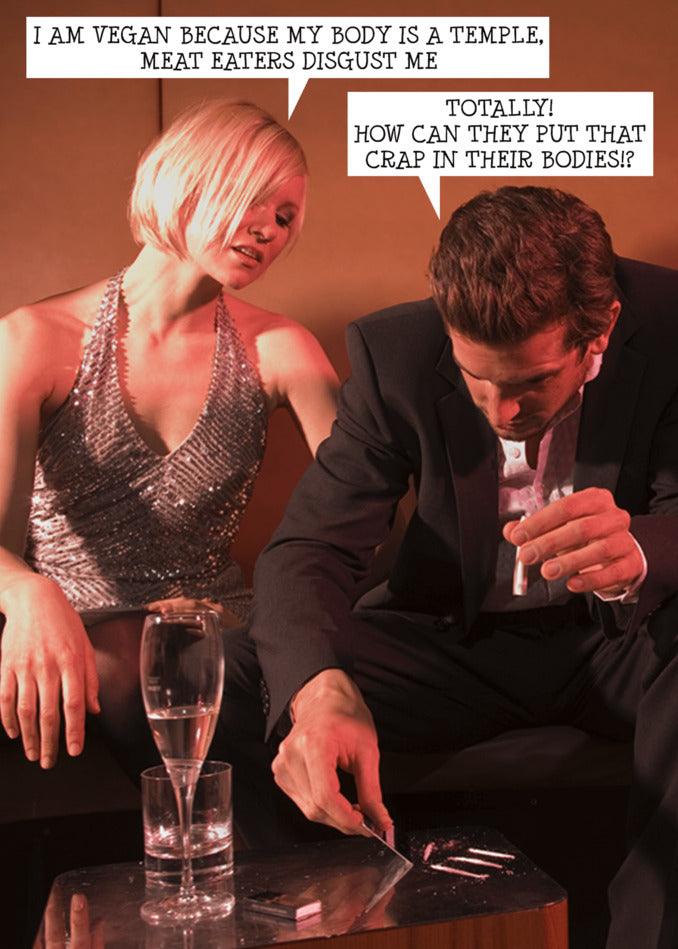 A man in a suit and a woman in a tuxedo, both are Twisted Gifts' Meat Eaters Funny Greeting Card consumers.