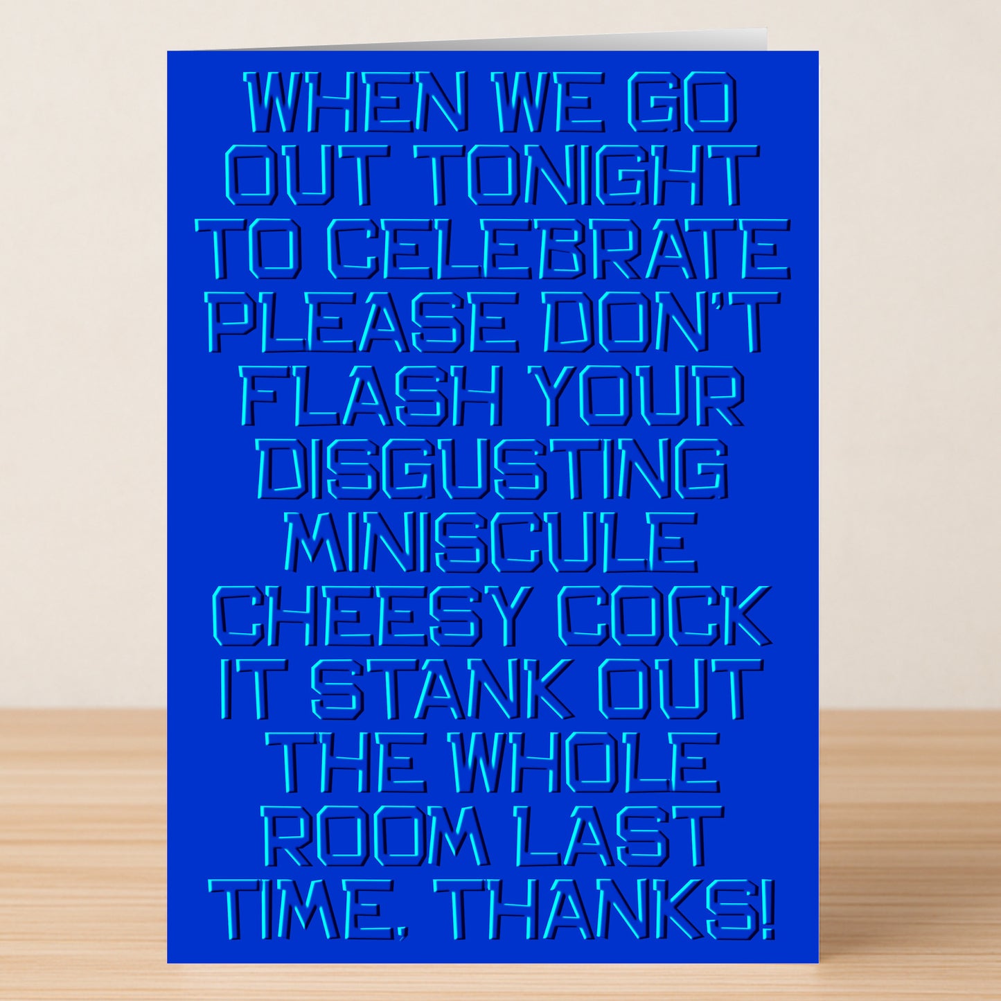 The Twisted Gifts Cheesy – Insulting Birthday Card is a blue, funny card with bold embossed text humorously warning against bad behavior at birthday celebrations.