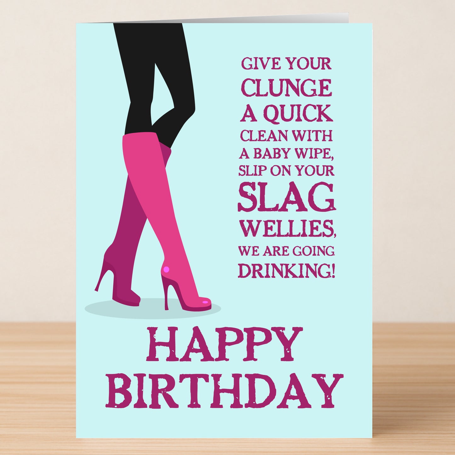 The Slag Wellies – Rude Birthday Card by Twisted Gifts features a cheeky illustration of a woman's legs in pink high heels and a bold, sassy birthday message—perfect for anyone who loves humor on their special day.