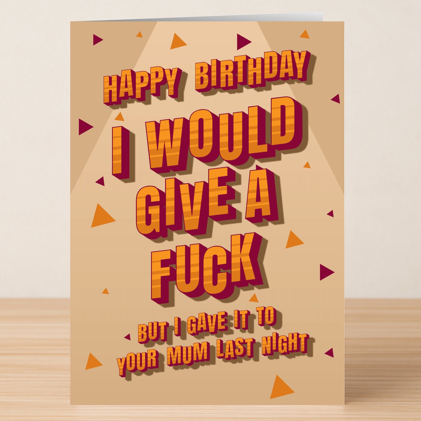 The “Last Night – Rude Birthday Card” by Twisted Gifts is a beige, funny card with orange triangular confetti and bold text: "Happy Birthday I would give a fuck but I gave it to your mum last night." A hilariously offensive choice.