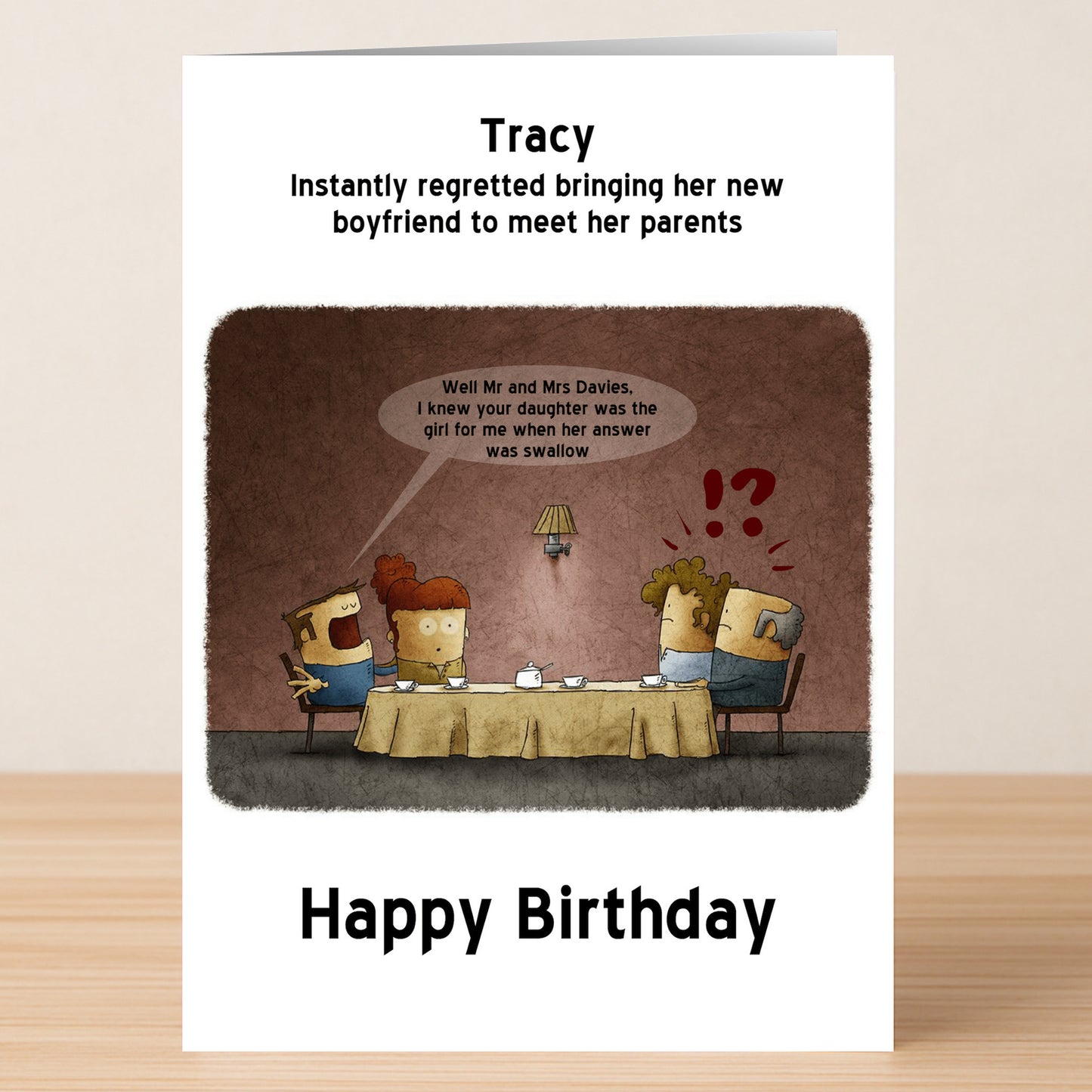 The Girl For Me – Rude Birthday Card by Twisted Gifts features three people at a table, with the man making an awkward comment to his girlfriend’s parents and text above: “Tracy instantly regretted bringing her new boyfriend to meet her parents.”.