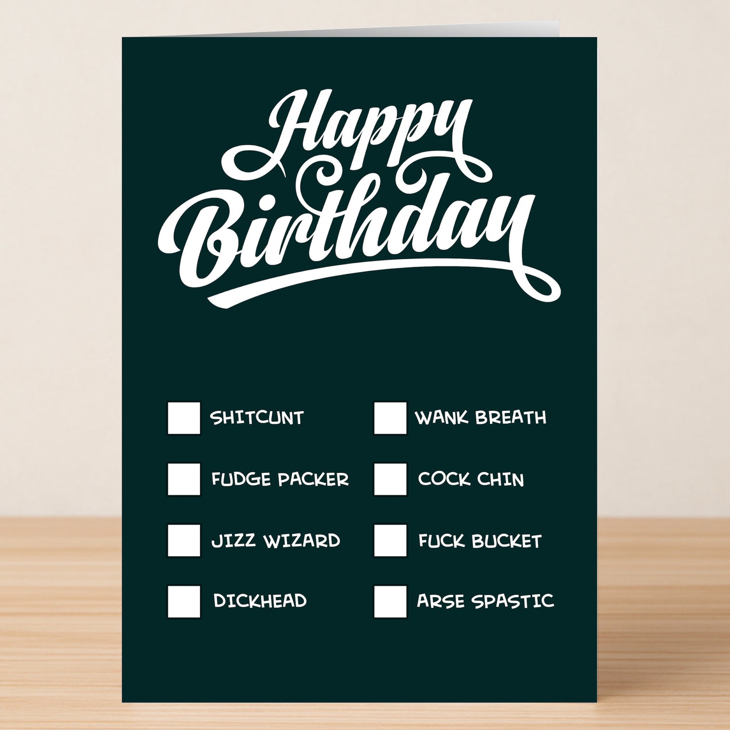 The Twisted Gifts "Check List – Insulting Birthday Card" features bold white "Happy Birthday" text and a list of funny insult checkboxes on a dark background.