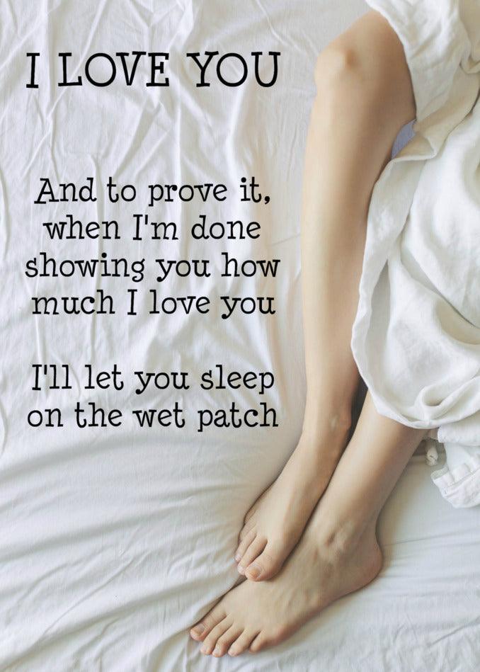 A woman laying on a bed expressing her love with the words "I love you" - perfect for a Wet Patch Rude Valentine's Card by Twisted Gifts.