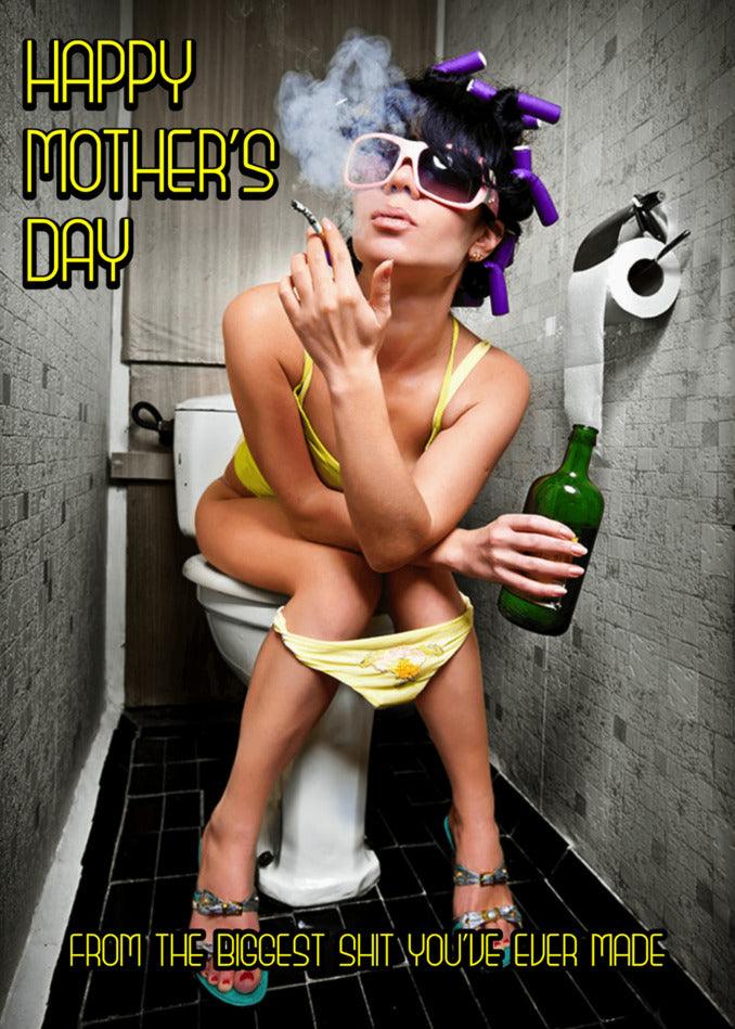 A funny woman sitting on a toilet smoking a cigarette while holding the Biggest Shit Rude Mother's Day Card by Twisted Gifts.
