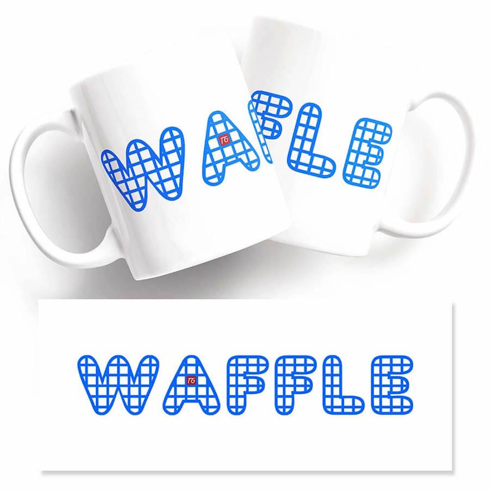 Two Blue Waffle Mugs with the unique design featuring the word waffle from Twisted Gifts.