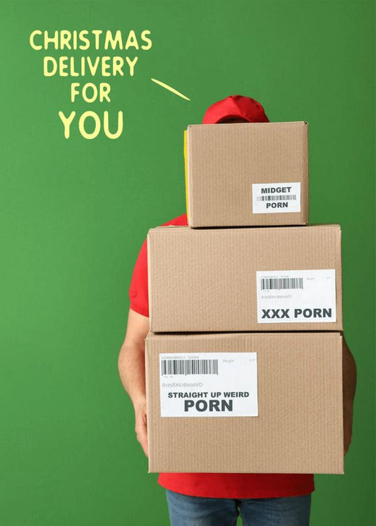 A man holding a stack of boxes with the words Twisted Gifts - Delivery Rude Christmas Card for you.