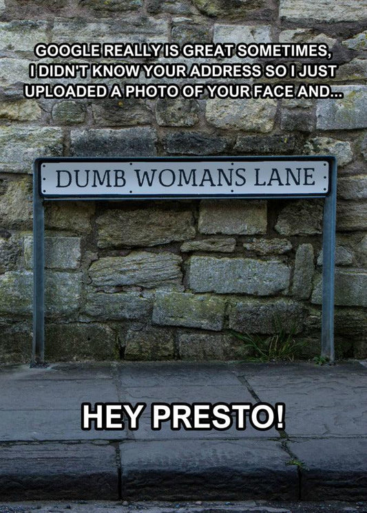 A funny street sign on a wall, perfect for Twisted Gifts' Dumb Woman Funny Greeting Card or other twisted gifts or greeting cards.