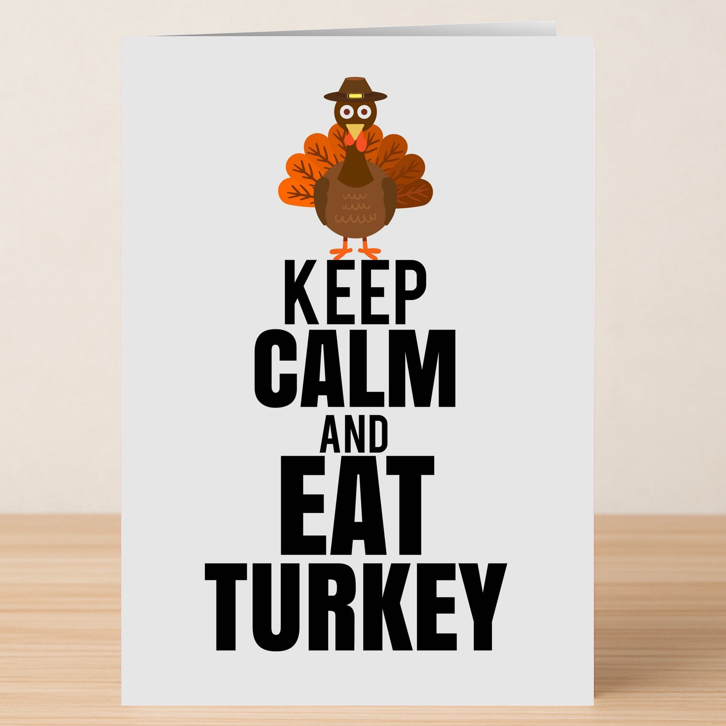 Spread festive cheer with the Twisted Gifts Keep Calm Christmas Card—featuring a cartoon turkey with colorful feathers and a hat above bold "KEEP CALM AND EAT TURKEY" text, it's the perfect funny holiday greeting!.