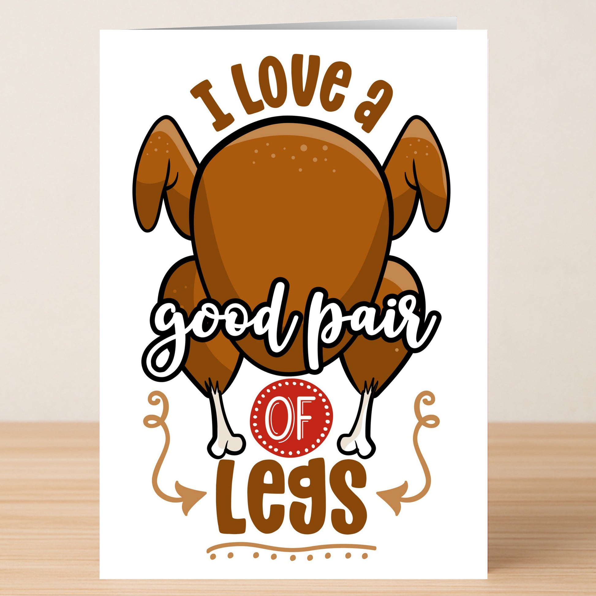 The Pair Of Legs Christmas Card by Twisted Gifts features a roasted turkey and the witty phrase "I love a good pair of legs"—a perfect funny card for turkey lovers or as a humorous holiday greeting.