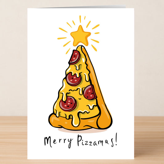 Twisted Gifts’ Pizzamas Christmas Card features a pizza-slice Christmas tree topped with pepperoni and a star, plus “Merry Pizzamas!”—a funny holiday greeting for any food lover.