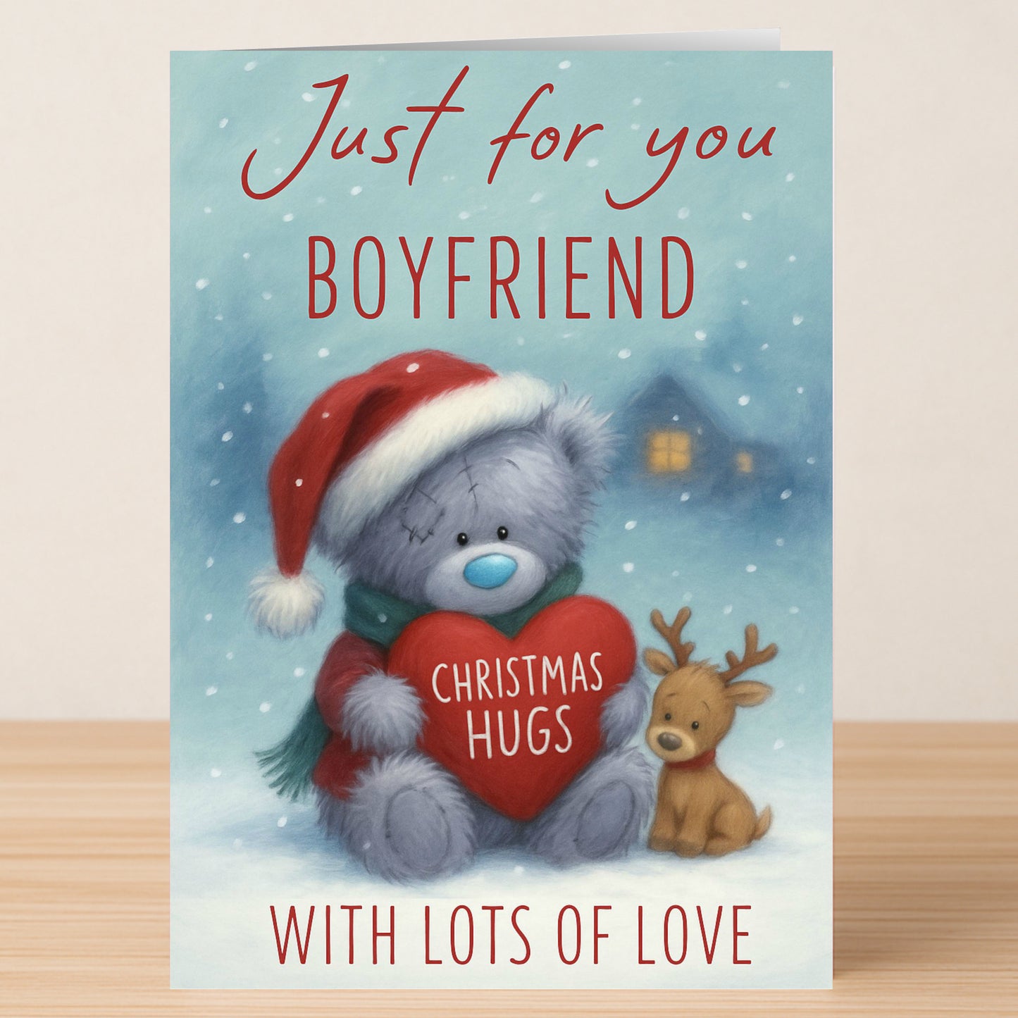 The Twisted Gifts Boyfriend Bear Christmas Card features a cute bear in a Santa hat holding a "Christmas Hugs" heart, with a reindeer and snowy background. Text: "Just for you Boyfriend, with lots of love.