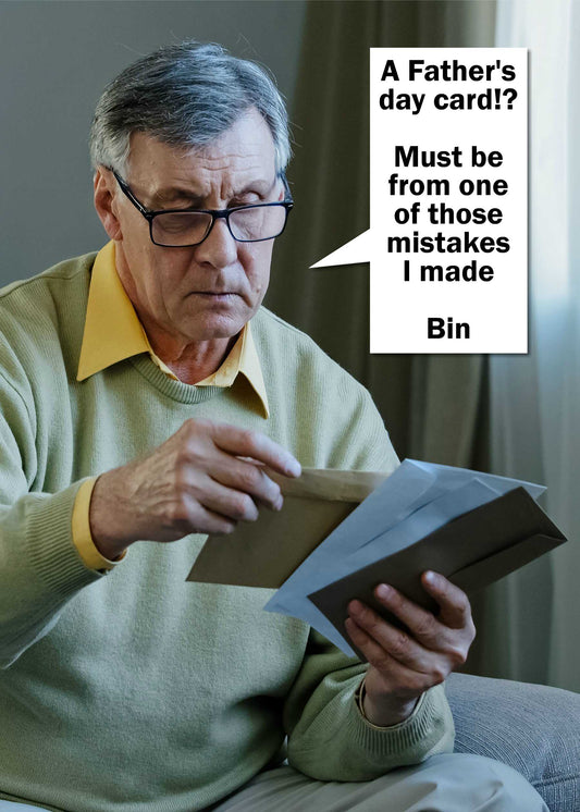 An elderly man wearing glasses and a green sweater is sitting and looking at an envelope. A speech bubble says, "A Father's Day card!? Must be from one of those mistakes I made. Bin Funny Father's Day Card by Twisted Gifts.