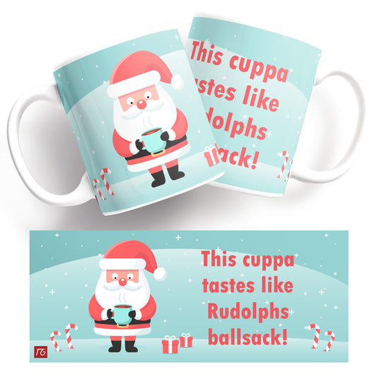 The Rudolph Mug by Twisted Gifts showcases two humorous mugs with a cartoon Santa holding a cup surrounded by candy canes, featuring the text: "This cuppa tastes like Rudolph's ballsack!" Ideal for a caffeine boost that brings joy and festive laughter.