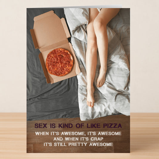 The Twisted Gifts Awesome Pizza Rude Greeting Card features a person on a bed next to an open pizza box, with funny text comparing sex and pizza—both are great even at their worst. Perfect for humor games or as a hilarious greeting card.