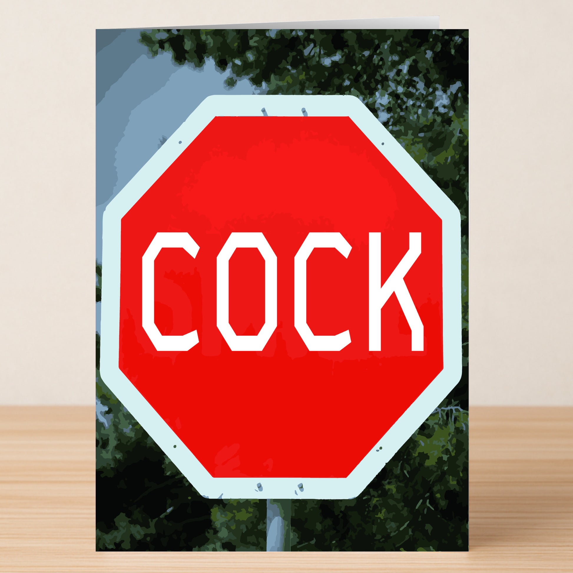Twisted Gifts' Cock Rude Greeting Card features a red octagonal sign with "COCK" in white lettering amid green foliage—a funny card, perfect for anyone who appreciates bold, cheeky humor.