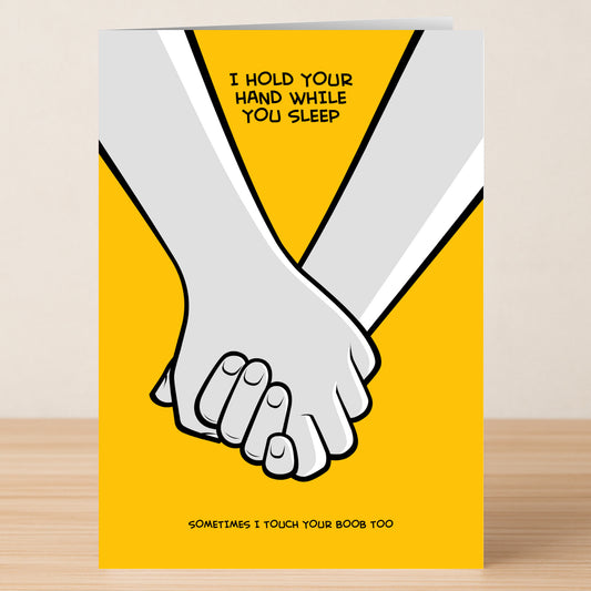 The "While You Sleep Rude Greeting Card" by Twisted Gifts features two hands on a yellow background and the cheeky message, "I HOLD YOUR HAND WHILE YOU SLEEP. SOMETIMES I TOUCH YOUR BOOB TOO." Guaranteed to make them laugh!.