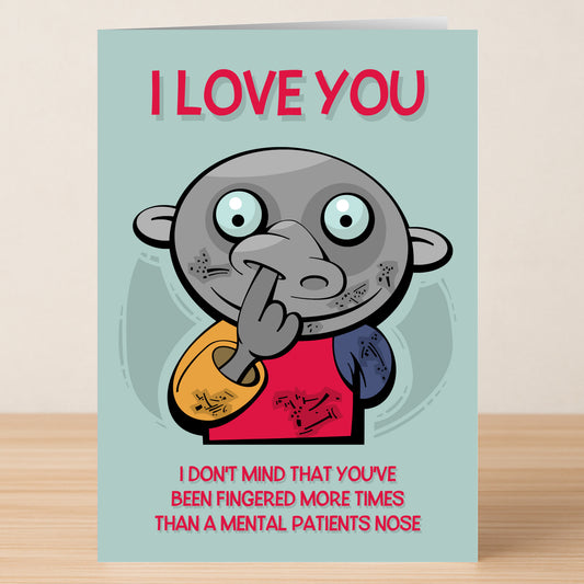 The Fingered Funny Greeting Card by Twisted Gifts features a cartoon picking its nose with the clever caption "I LOVE YOU" and a humorous message about being fingered more times than a mental patient's nose. Printed on premium materials.