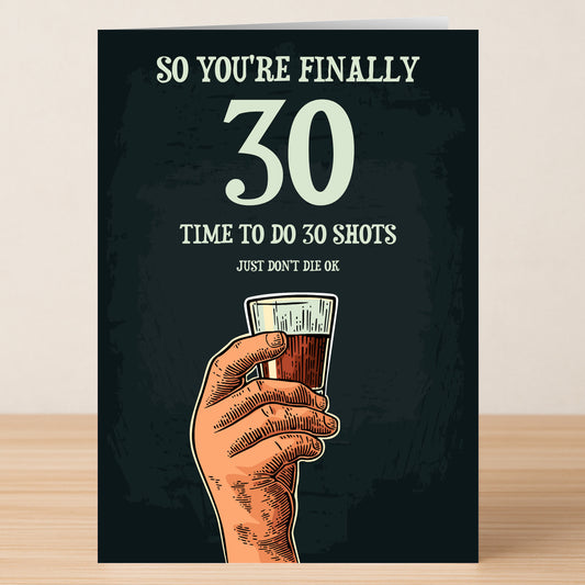 The 30 - Shots 30 Funny Birthday Card by Twisted Gifts features a hand holding a shot glass with the message, "So you're finally 30. Time to do 30 shots. Just don't die ok,"—ideal for sharing laughs on a milestone birthday.