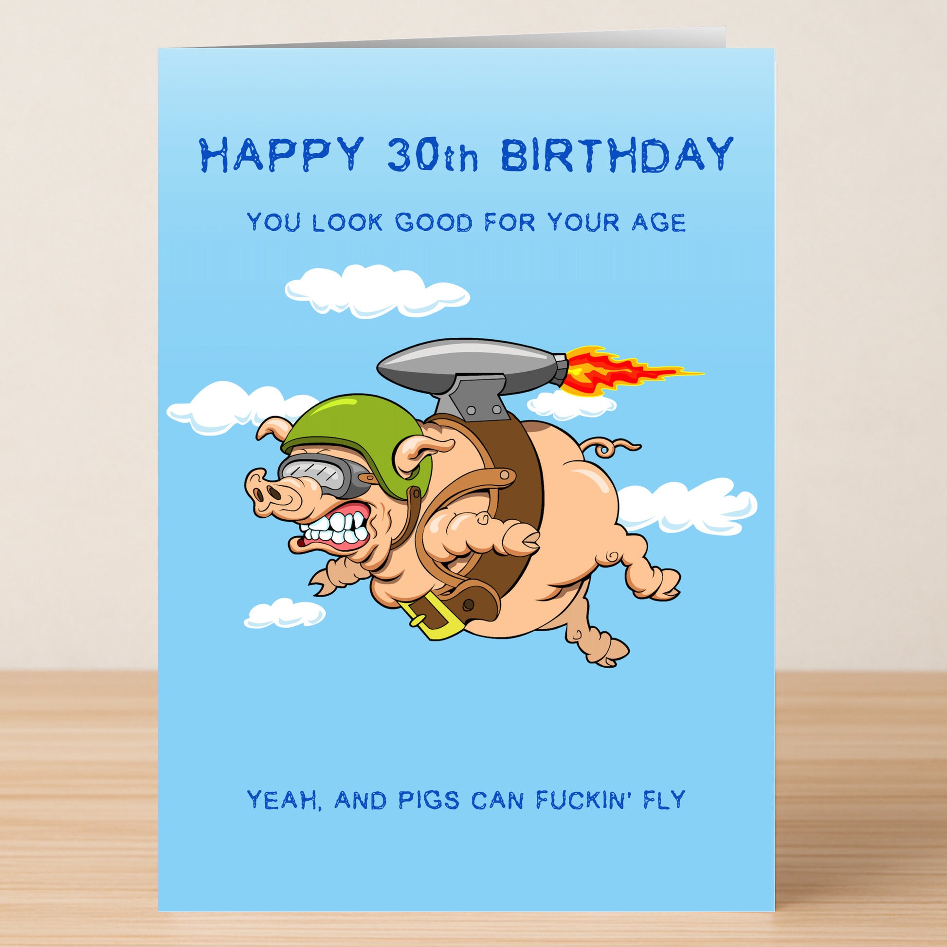 Twisted Gifts' "30 - Pigs Can Fly" card features a jetpack pig cartoon and the text: "Happy 30th Birthday. You look good for your age. Yeah, and pigs can fly." A fun, insulting birthday card for anyone turning 30!.