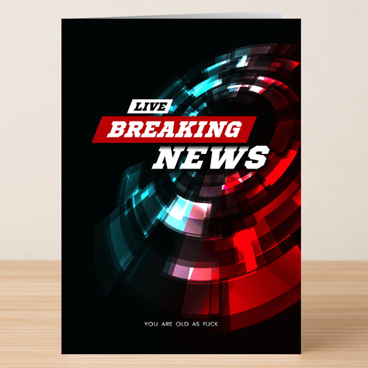 The Breaking News Insulting Birthday Card by Twisted Gifts features a bold "LIVE BREAKING NEWS" headline over a red and blue abstract background, ending with the funny message "YOU ARE OLD AS FUCK"—an ideal insulting birthday card.