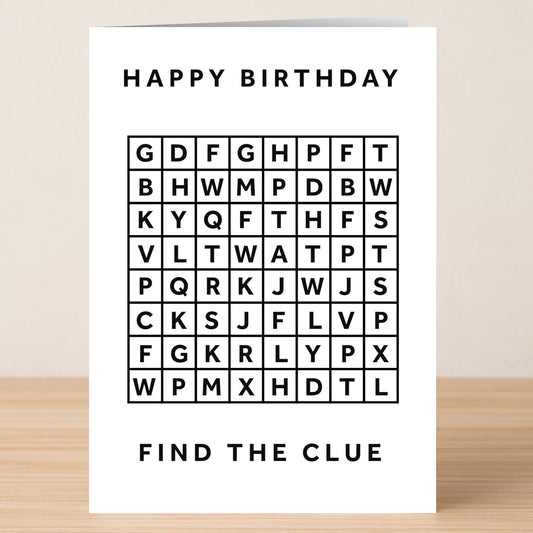 The Word Search Twat Rude Birthday Card by Twisted Gifts features a word search puzzle with "HAPPY BIRTHDAY" above and "FIND THE CLUE" below—a cheeky twist on traditional greetings, perfect for birthdays.