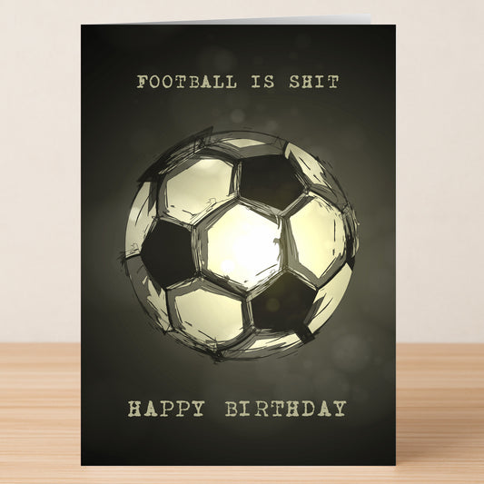 The Football Insulting Birthday Card by Twisted Gifts features a soccer ball sketch with "FOOTBALL IS SHIT" above and "HAPPY BIRTHDAY" below—ideal for anyone who loves witty insults and a one-of-a-kind birthday greeting.