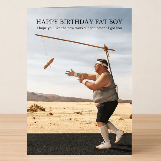 The "Fat Boy Funny Birthday Card" by Twisted Gifts features a man in workout gear chasing a hot dog in the desert, making it the perfect hilarious birthday card for anyone who loves to laugh.