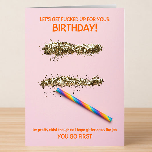 Celebrate their big day with the Glitter Funny Birthday Card from Twisted Gifts—featuring two lines of glitter, a colorful striped straw, and hilarious "getting glitter fucked up when skint" text for extra laughs!.