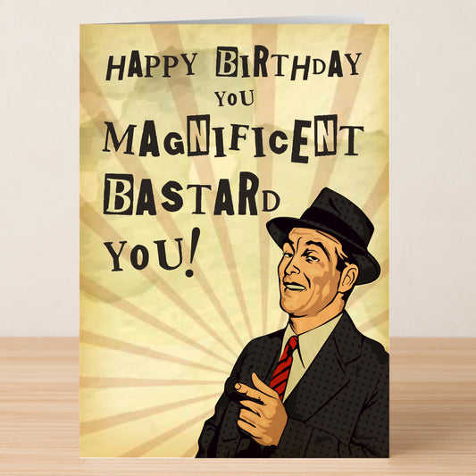 The Magnificent Funny Birthday Card by Twisted Gifts features a retro man in a suit and hat with "Happy Birthday You Magnificent Bastard You!" on a sunburst background—a hilarious and clever card for birthdays.