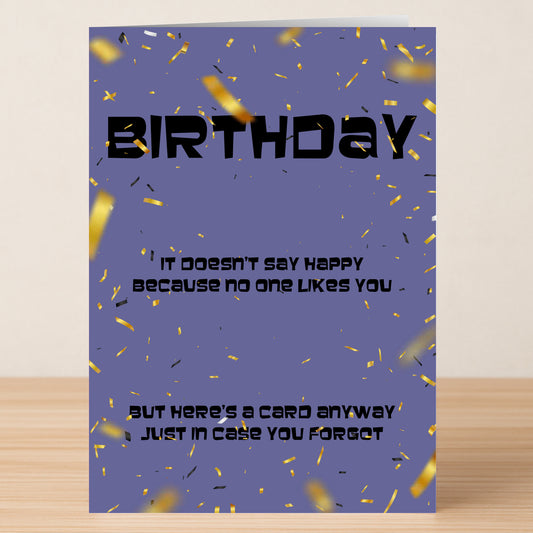 The No Happy Funny Birthday Card by Twisted Gifts features a purple design with gold and black confetti and reads: "BIRTHDAY. It doesn't say happy because no one likes you. But here's a card anyway just in case you forgot.