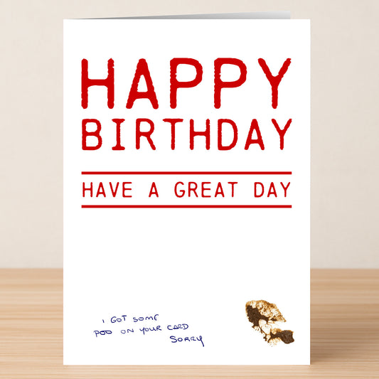 The Twisted Gifts Poo Sorry Funny Birthday Card shows handwritten text: "I got some poo on your card sorry." It's a playful birthday card in red with a brown stain—great for friends who enjoy humorous designs.
