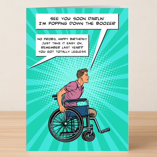 The Legless Funny Birthday Card by Twisted Gifts features a man in a wheelchair with comic-style, witty birthday banter on a teal starburst background—a creative, humorous card guaranteed to make them smile.