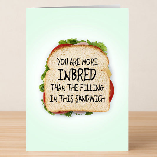The Inbread Funny Birthday Card by Twisted Gifts features a sandwich and the joke "You are more inbred than the filling in this sandwich." It's a hilarious way to make someone's birthday extra special!.