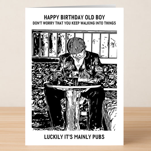 The Old Boy Funny Birthday Card by Twisted Gifts features a black and white image of a man at a pub table, with the text: "Happy Birthday Old Boy" above and "Luckily it's mainly pubs" below.