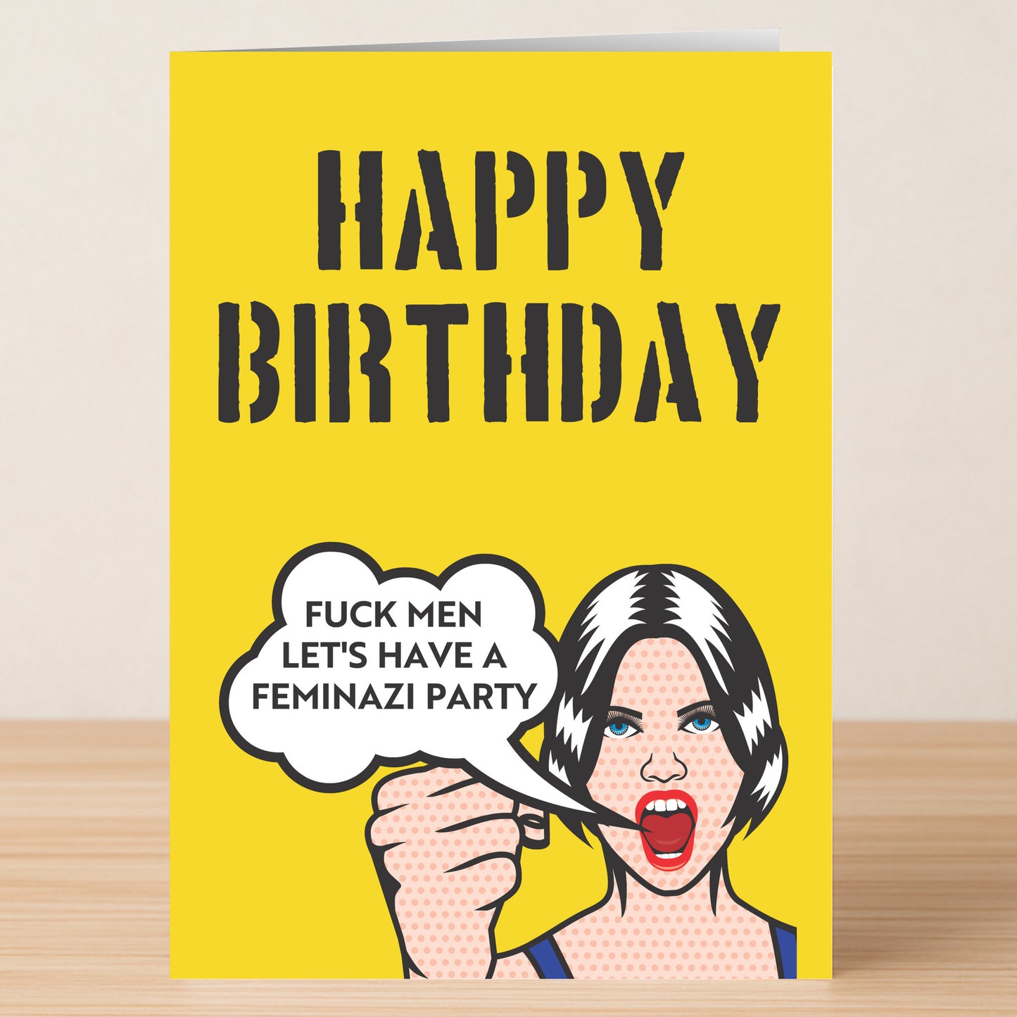 The Feminazi Funny Birthday Card by Twisted Gifts features bold "HAPPY BIRTHDAY" text and a pop art woman saying, "FUCK MEN LET'S HAVE A FEMINAZI PARTY" on yellow—a witty, edgy card for those who love bold humor.
