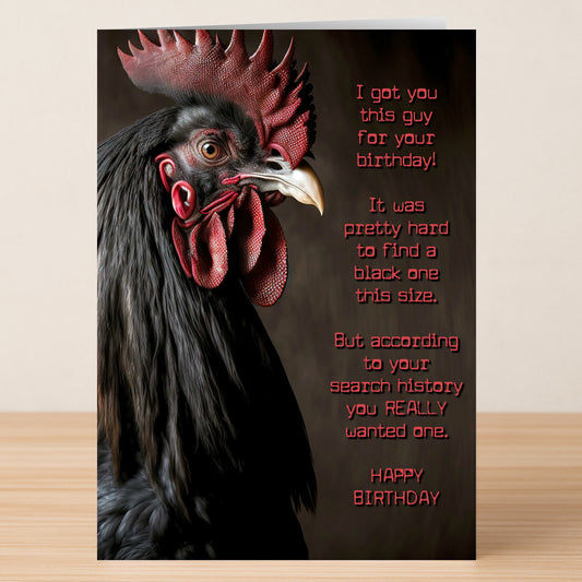 The Big Black Funny Birthday Card by Twisted Gifts features a close-up black rooster and cheeky red text—ideal for anyone who loves a humorous take on their search history!.