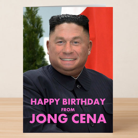 The Twisted Gifts "Jong Cena, Funny Birthday Card" features John Cena’s face on Kim Jong Un’s body with "HAPPY BIRTHDAY FROM JONG CENA" in pink—an amusing card to make any birthday extra fun.