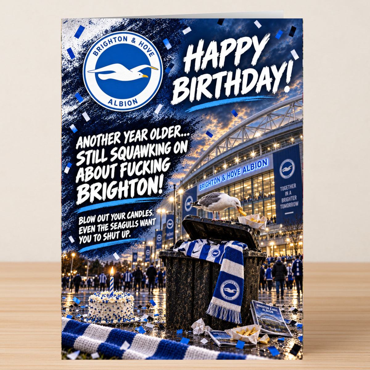 Brighton – Funny Birthday Card featuring the Brighton & Hove Albion logo and a seagull eating trash in front of a stadium, with a birthday wish.