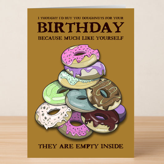 The Empty Insulting Birthday Card by Twisted Gifts features a doughnut illustration and the message: "I thought I’d buy you doughnuts for your birthday because much like yourself, they are empty inside." Ideal for fans of cheeky humor.