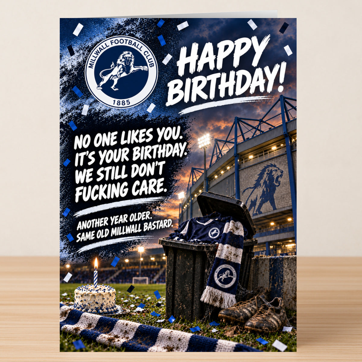 Millwall – Funny Birthday Card featuring a stadium, cake, and a trash bin with a football scarf and jersey, reading, “Happy Birthday! Another year older. Same old Millwall bastard.”