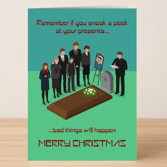 The Sneak A Peek Funny Christmas Card by Twisted Gifts features people by a grave and a headstone, with text humorously warning that peeking at presents leads to trouble. "Merry Christmas" appears at the bottom—a perfect dark humor card.