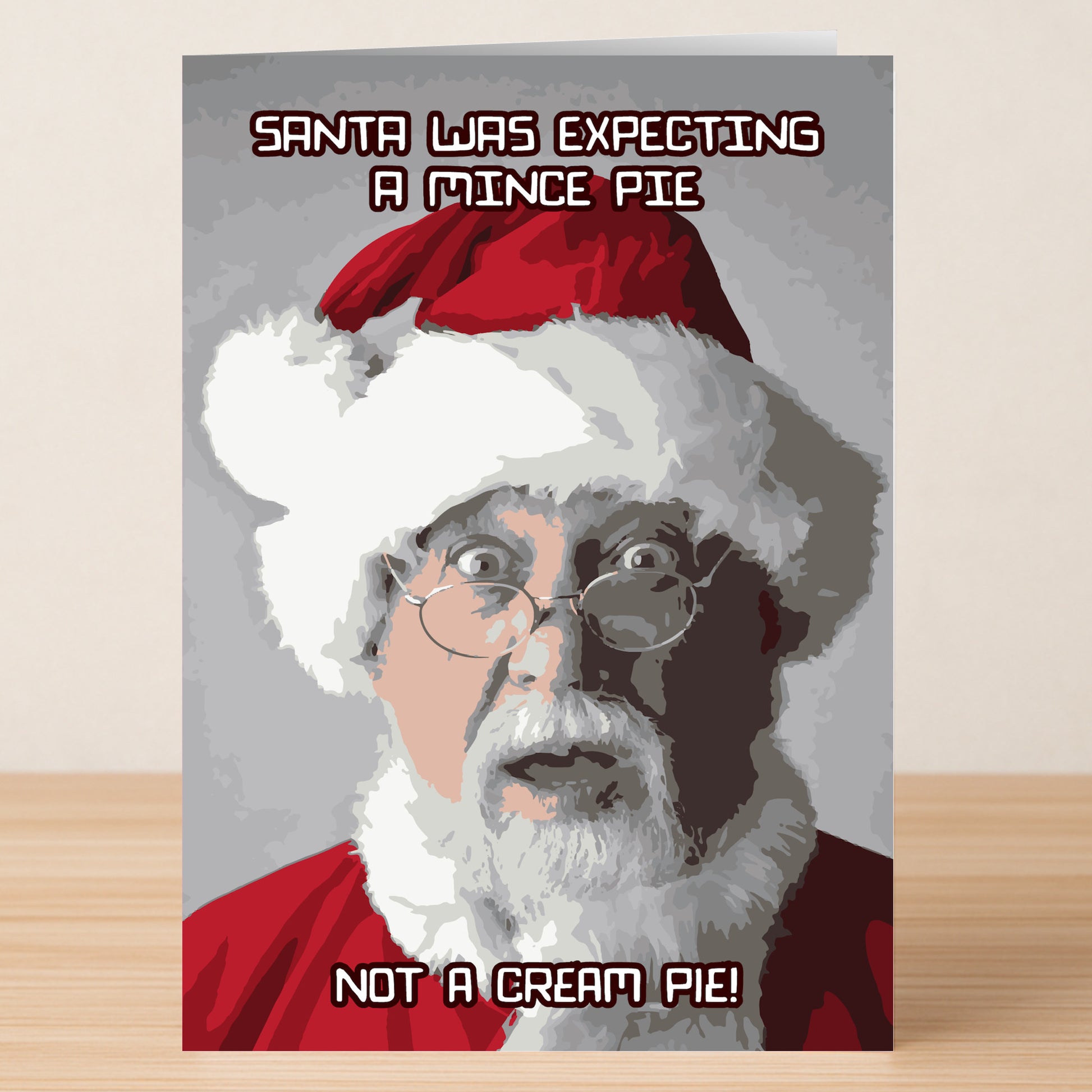 The Cream Pie Rude Christmas Card by Twisted Gifts features a surprised Santa with the caption, "Santa was expecting a mince pie, not a cream pie!"—a hilarious pick for those who want a truly funny Christmas card.