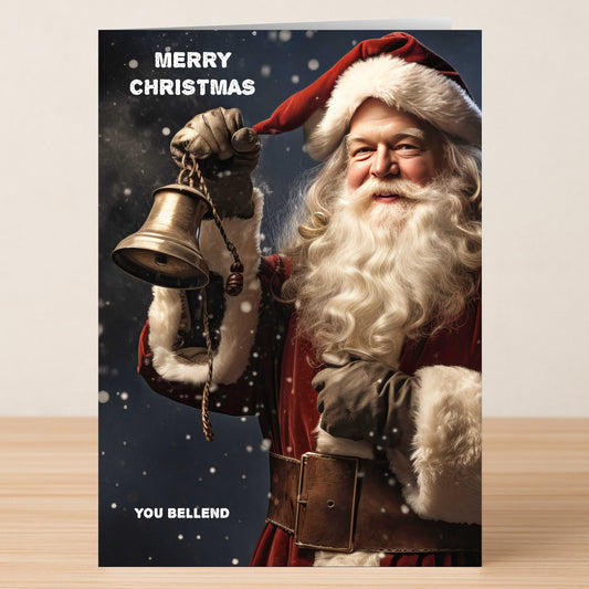 The Bellend Rude Christmas Card by Twisted Gifts features Santa with a bell, snowy backdrop, "Merry Christmas" above, and "You Bellend" below—ideal for anyone seeking a cheeky card this holiday season.