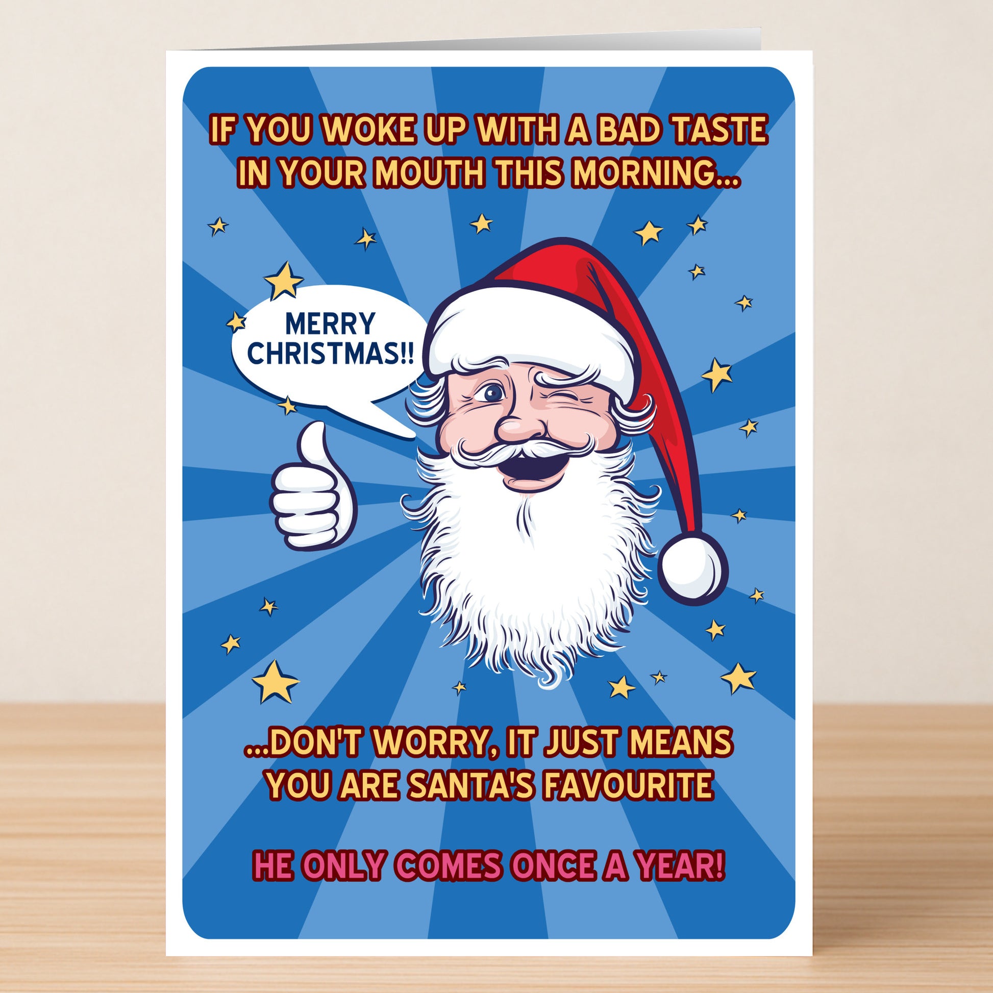 The Bad Taste Rude Christmas Card by Twisted Gifts features a cartoon Santa winking and giving a thumbs up with funny "Santa’s favorite" text and a "Merry Christmas!!" speech bubble—perfect for spreading cheeky holiday cheer.
