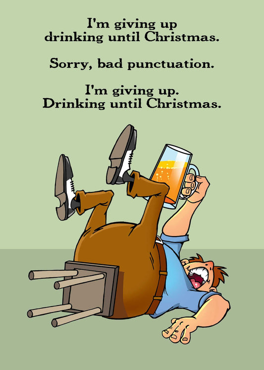 A person lies on the ground with an overturned chair, holding a beer, next to the text: "I'm giving up drinking until Christmas. Sorry, bad punctuation. I'm giving up. Drinking until Christmas." This scene is perfect for Twisted Gifts’ Bad Punctuation Funny Christmas Card!