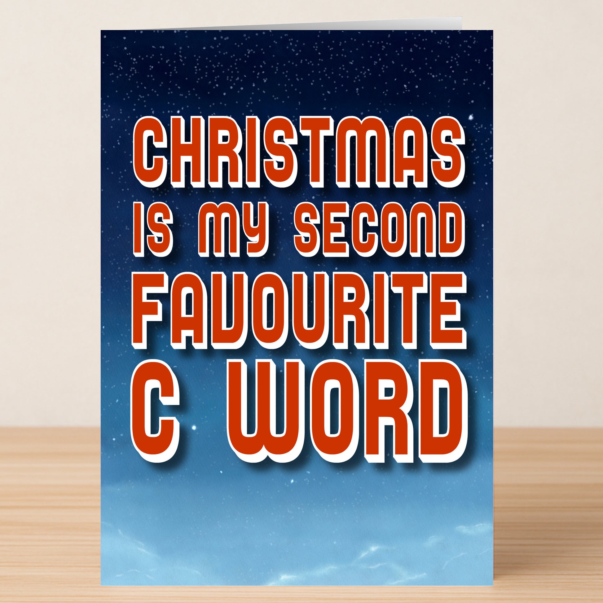 The Favourite Word Christmas Card by Twisted Gifts features bold red and white text, "Christmas is my second favourite C word," on a starry night sky—perfect for anyone who enjoys cheeky holiday humour.